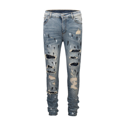 Denim con toppe borchiate - Indaco lavato